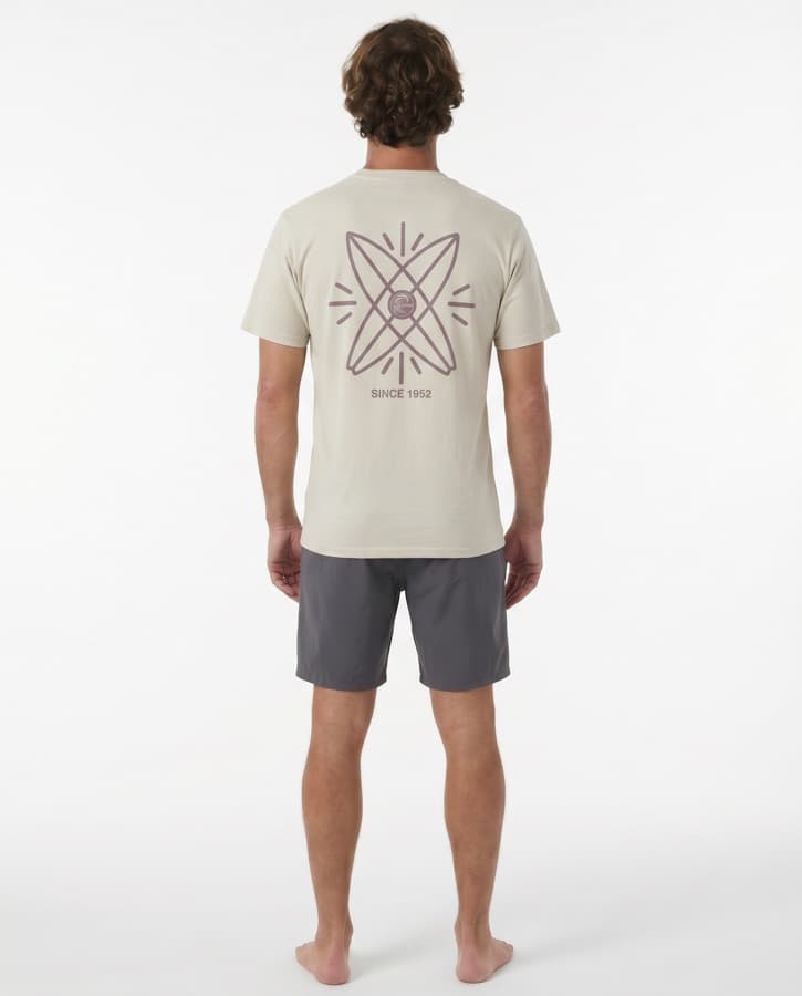 Back view of a printed tee on model against a plain ground